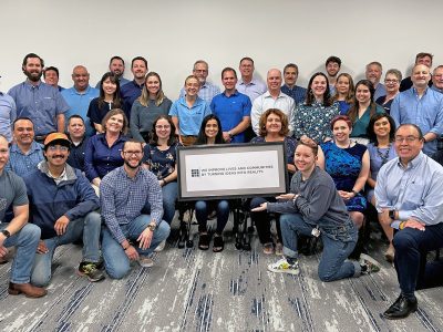 Our Purpose image of Halff's Austin office weaing blue to celebrate flood awareness week